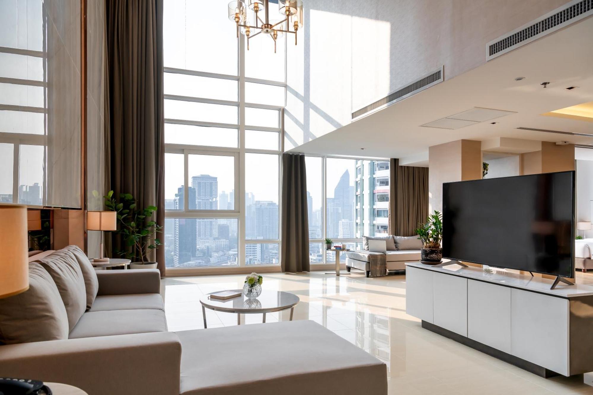 Jasmine 59 Hotel - SHA Extra Plus Bangkok Exterior foto A living room in a luxury apartment
