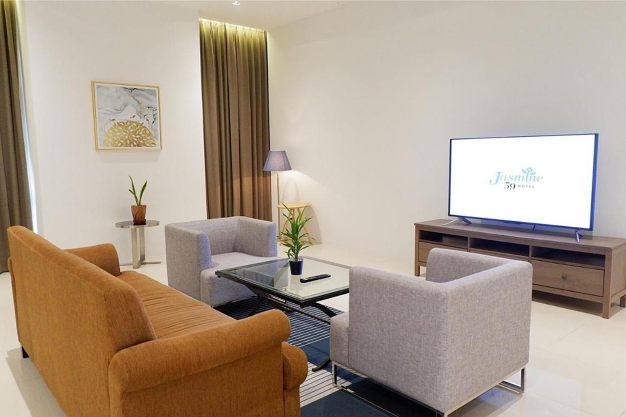 Jasmine 59 Hotel - SHA Extra Plus Bangkok Exterior foto Living room